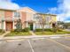Two-story townhome with attractive landscaping and parking at 30405 Elderwood Dr, Wesley Chapel, FL 33543