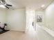 Upstairs hallway with access to bedrooms at 30405 Elderwood Dr, Wesley Chapel, FL 33543