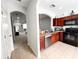 Modern kitchen with stainless steel appliances and wood cabinets at 30405 Elderwood Dr, Wesley Chapel, FL 33543