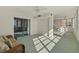 Spacious living area with sliding doors to balcony at 5130 Brittany S Dr # 607, St Petersburg, FL 33715