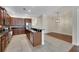 Open concept kitchen and dining area with hardwood floors at 7510 S Sparkman St, Tampa, FL 33616