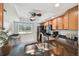 Kitchen features modern appliances, granite countertops, and a breakfast nook with natural light at 7550 Sunshine Skyway S Ln # T48, St Petersburg, FL 33711