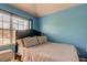 Light and airy bedroom with a comfortable double bed at 10280 Post Harvest Dr, Riverview, FL 33578