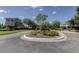 Landscaped entrance to Ventura Bay community with a charming entrance feature at 10280 Post Harvest Dr, Riverview, FL 33578