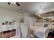 Formal dining area with hardwood floors and white chairs at 10280 Post Harvest Dr, Riverview, FL 33578
