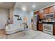 Modern kitchen with stainless steel appliances and breakfast bar at 10280 Post Harvest Dr, Riverview, FL 33578