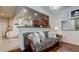 Open living room with a zebra print couch and kitchen view at 10280 Post Harvest Dr, Riverview, FL 33578