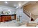 Bright living room with white couch and open concept design at 10280 Post Harvest Dr, Riverview, FL 33578