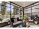 Spacious screened-in porch, perfect for relaxing at 10280 Post Harvest Dr, Riverview, FL 33578