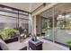 Bright and airy screened porch with sliding doors at 10280 Post Harvest Dr, Riverview, FL 33578