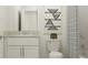 Simple bathroom with white vanity and shower/tub combo at 11139 Wishing Cloud Rd, Land O Lakes, FL 34638