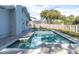 Refreshing pool and spa combo with brick pavers at 1497 Rosetree Ct, Clearwater, FL 33764