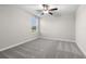 Spacious bedroom with neutral walls and carpet at 15523 Peace River Pl, Sun City Center, FL 33573
