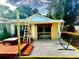 Outdoor deck with seating area and string lights at 2666 44Th S St, Gulfport, FL 33711