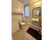 Simple bathroom with toilet, sink, and storage at 2666 44Th S St, Gulfport, FL 33711