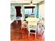 Casual dining area with round table and chairs, near kitchen at 2666 44Th S St, Gulfport, FL 33711