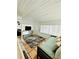 Spacious living room with tiled floors and a daybed at 2666 44Th S St, Gulfport, FL 33711