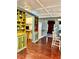 Open living area with built-in shelving and hardwood floors at 2666 44Th S St, Gulfport, FL 33711