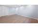 Bright bedroom with light walls and wood-look flooring at 4000 14Th Ne Way, St Petersburg, FL 33703