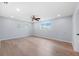 Spacious bedroom featuring light walls and wood-look flooring at 4000 14Th Ne Way, St Petersburg, FL 33703