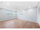 Spacious bedroom with light walls and wood-look flooring at 4000 14Th Ne Way, St Petersburg, FL 33703