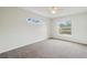 Bright bedroom with carpet flooring, large windows, and ceiling fan at 5506 79Th E Ave, Palmetto, FL 34221