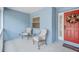 Inviting front porch with seating, perfect for relaxing and enjoying the Florida weather at 5506 79Th E Ave, Palmetto, FL 34221