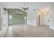 Spacious living area with vaulted ceilings, tile floors, and a view of the patio at 5506 79Th E Ave, Palmetto, FL 34221