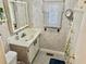 Clean bathroom with vanity, toilet, and shower/tub combination at 9790 66Th N St # 340, Pinellas Park, FL 33782