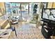 Relaxing Florida room with comfortable seating, a TV, and a view of the outdoors at 9790 66Th N St # 340, Pinellas Park, FL 33782