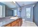 Simple bathroom with wood cabinets and granite countertop at 13181 Linzia Ln, Spring Hill, FL 34609