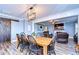 Farmhouse dining room with sliding barn door at 13181 Linzia Ln, Spring Hill, FL 34609