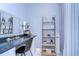 Stylish vanity with a large mirror and plenty of storage at 13181 Linzia Ln, Spring Hill, FL 34609