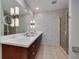 Modern bathroom with double vanity and a large walk-in shower at 1120 E Kennedy Blvd # 1221, Tampa, FL 33602