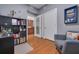 Bright home office features built-in shelving and comfortable seating at 1120 E Kennedy Blvd # 1221, Tampa, FL 33602