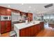 Modern kitchen with stainless steel appliances and an island at 1120 E Kennedy Blvd # 1221, Tampa, FL 33602