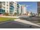 Community pool with lounge chairs and tables at 1120 E Kennedy Blvd # 1221, Tampa, FL 33602