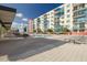 Community pool and deck with building view at 1120 E Kennedy Blvd # 1221, Tampa, FL 33602