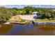 Private boat ramp with dock on calm waters at 119 Saint Pierres Way, Apollo Beach, FL 33572