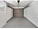 Clean, empty garage with ample space for parking and storage at 1201 Harkness Way, Sun City Center, FL 33573