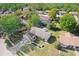 Aerial view of a single-story house in a residential neighborhood at 13209 Woodward Dr, Hudson, FL 34667