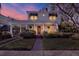 Two-story home with white siding and a manicured lawn at 2220 12Th N St, St Petersburg, FL 33704