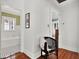 Bright hallway with hardwood floors and access to bathroom and bedroom at 2220 12Th N St, St Petersburg, FL 33704