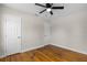 Bedroom with hardwood floors and two doors at 2300 30Th N Ave, St Petersburg, FL 33713