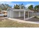 Newly built garage with covered parking and a side yard at 2300 30Th N Ave, St Petersburg, FL 33713