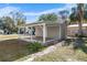 Covered patio and detached garage with new pergola at 2300 30Th N Ave, St Petersburg, FL 33713