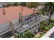 Aerial view showcasing building exterior and screened patios at 354 Larboard Way, Clearwater Beach, FL 33767