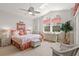 King bedroom with coastal decor and large windows at 354 Larboard Way, Clearwater Beach, FL 33767