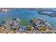 Aerial view highlighting the house's location on the waterfront at 409 161St Ave, Redington Beach, FL 33708