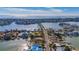 Wide shot of property and surrounding waterfront community at 409 161St Ave, Redington Beach, FL 33708